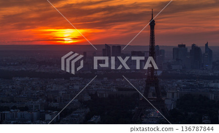 Panorama of Paris at sunset timelapse. Eiffel tower view from montparnasse building in Paris - France 136787844