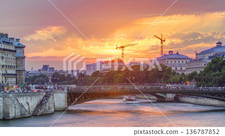 Le Pont D'Arcole bridge at sunset with boats timelapse, Paris, France, Europe 136787852