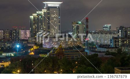 Night Moscow cityscape from rooftop timelapse. Residential buildings at night. Night view from the roof Night Moscow cityscape from rooftop timelapse. Residential buildings at night. Night view from the roof 136787879