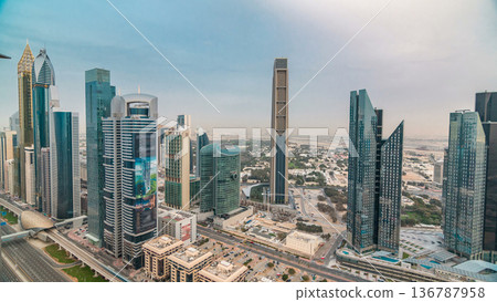 Dubai skyline timelapse at sunset with city center skyscrapers and Sheikh Zayed road traffic, Dubai, United Arab Emirates Dubai skyline timelapse at sunset with city center skyscrapers and Sheikh Zayed road traffic, Dubai, United Arab Emirates 136787958