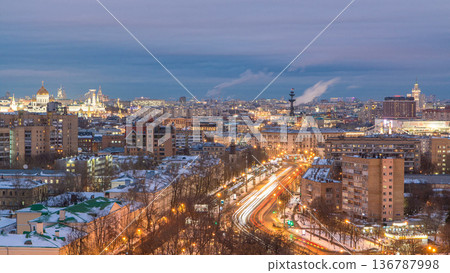 Moscow city Russia skyline aerial panoramic top view day to night timelapse urban winter snow scenery architecture background 136787998