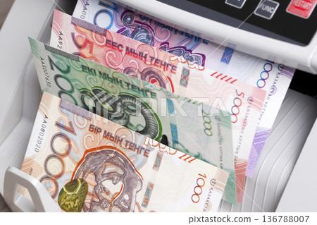 Kazakhstani tenge in a counting machine 136788007