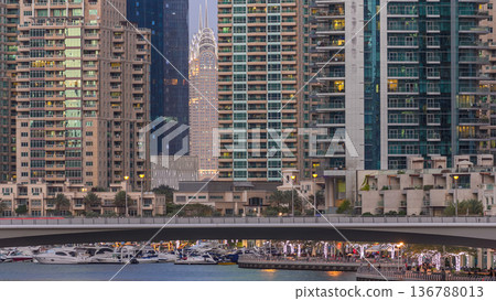 Dubai Marina towers and canal in Dubai day to night timelapse Dubai Marina towers and canal in Dubai day to night timelapse 136788013