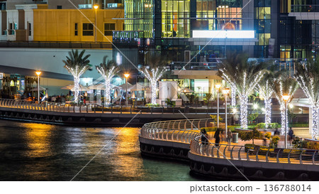 Promenade in Dubai Marina timelapse at night, UAE. Promenade in Dubai Marina timelapse at night, UAE. 136788014