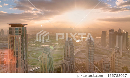 Sunrise in Dubai Marina with towers and harbor with yacht from skyscraper, Dubai, UAE timelapse Sunrise in Dubai Marina with towers and harbor with yacht from skyscraper, Dubai, UAE timelapse 136788017