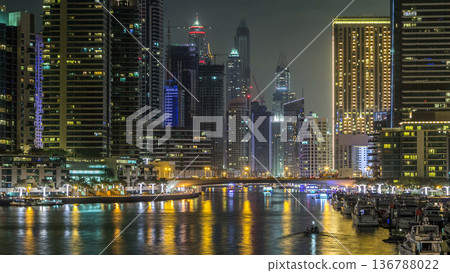 Promenade in Dubai Marina timelapse at night, UAE. Promenade in Dubai Marina timelapse at night, UAE. 136788022