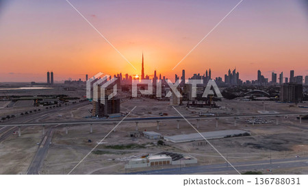 Sunset with skyline of Downtown Dubai in the evening timelapse. 136788031