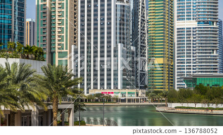 Residential buildings in Jumeirah Lake Towers timelapse in Dubai, UAE. 136788052