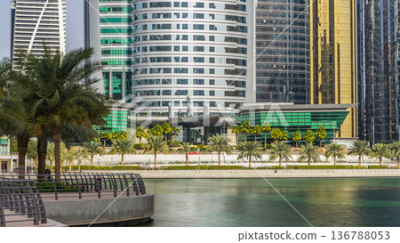 Residential buildings in Jumeirah Lake Towers timelapse in Dubai, UAE. Residential buildings in Jumeirah Lake Towers timelapse in Dubai, UAE. 136788053