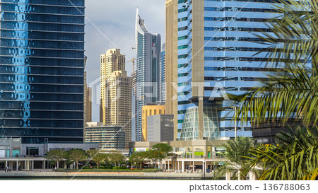 Residential buildings in Jumeirah Lake Towers timelapse in Dubai, UAE. Residential buildings in Jumeirah Lake Towers timelapse in Dubai, UAE. 136788063