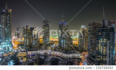 Aerial top view at night timelapse of Dubai Marina in Dubai, UAE 136788092