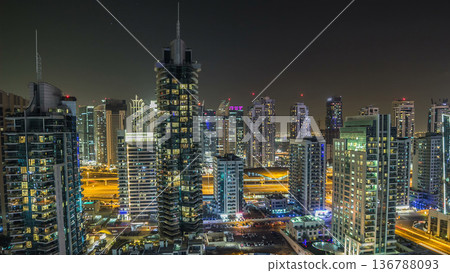 Aerial top view at night timelapse of Dubai Marina in Dubai, UAE Aerial top view at night timelapse of Dubai Marina in Dubai, UAE 136788093
