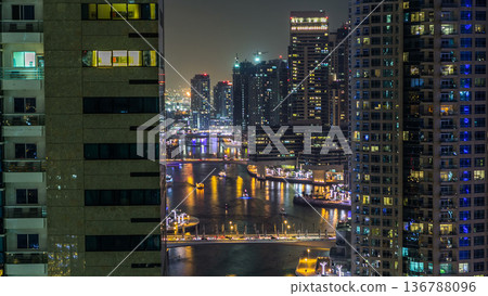 Aerial top view at night timelapse of Dubai Marina in Dubai, UAE Aerial top view at night timelapse of Dubai Marina in Dubai, UAE 136788096