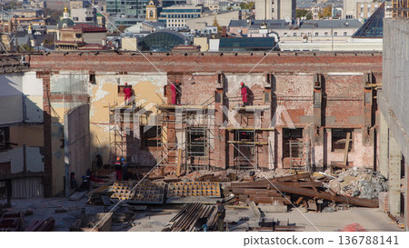 Bricklayers laying bricks to repair old walls timelapse. Bricklayers laying bricks to repair old walls timelapse. 136788141