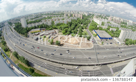 Traffic on the elevated avenue road aerial timelapse overpass on highway in a big city Traffic on the elevated avenue road aerial timelapse overpass on highway in a big city 136788147