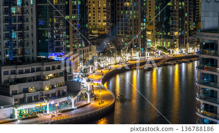 Promenade in Dubai Marina timelapse at night, UAE. Top view 136788186