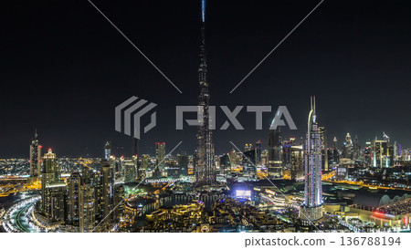 Dubai Downtown at night timelapse view from the top in Dubai, United Arab Emirates Dubai Downtown at night timelapse view from the top in Dubai, United Arab Emirates 136788194