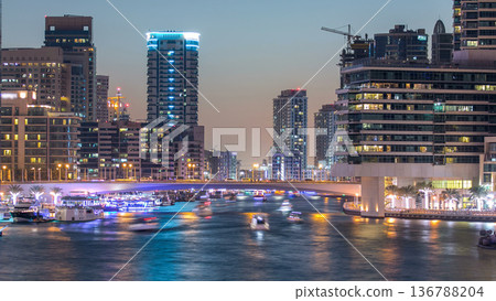 Dubai Marina towers and canal in Dubai day to night timelapse Dubai Marina towers and canal in Dubai day to night timelapse 136788204