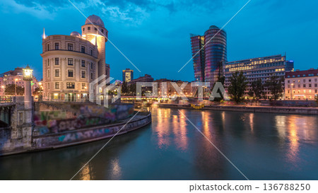 Urania and Danube Canal day to night timelapse in Vienna. 136788250