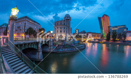 Urania and Danube Canal day to night timelapse in Vienna. Urania and Danube Canal day to night timelapse in Vienna. 136788269