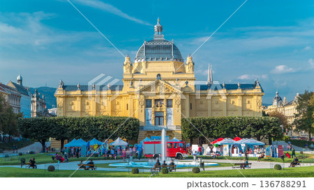 Timelapse view of Art pavilion at King Tomislav square in Zagreb, Croatia. Timelapse view of Art pavilion at King Tomislav square in Zagreb, Croatia. 136788291