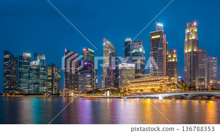 Stunning twilight view of Singapore city cityscape skyscrapers day to night timelapse Stunning twilight view of Singapore city cityscape skyscrapers day to night timelapse 136788353