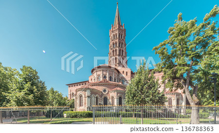 The cobbled parvis of the Basilica of Saint Sernin in Toulouse, France, timelapse hyperlapse. 136788363