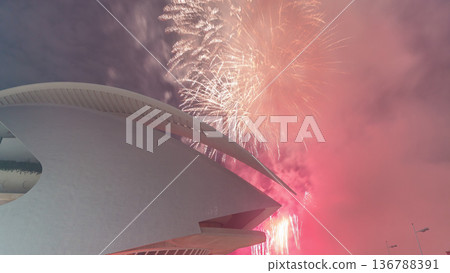 Aerial timelapse of the Palau de les Arts Reina Sofia in Valencia during a fireworks show. Spain Aerial timelapse of the Palau de les Arts Reina Sofia in Valencia during a fireworks show. Spain 136788391