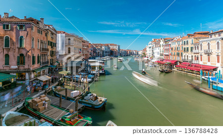 Buildings and Gondolas in Venice timelapse, Grand Canal view from Rialto Bridge. 136788428