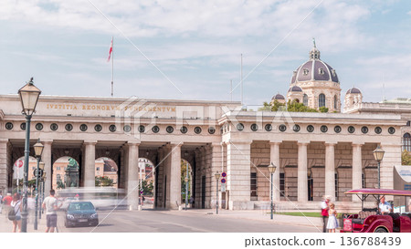 Exterior of outer castle gate with Ringstrasse on background timelapse in Vienna city in sunny day. Exterior of outer castle gate with Ringstrasse on background timelapse in Vienna city in sunny day. 136788439