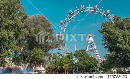 Wiener Riesenrad in Prater timelapse - oldest and biggest ferris wheel in Austria. Wiener Riesenrad in Prater timelapse - oldest and biggest ferris wheel in Austria. 136788450