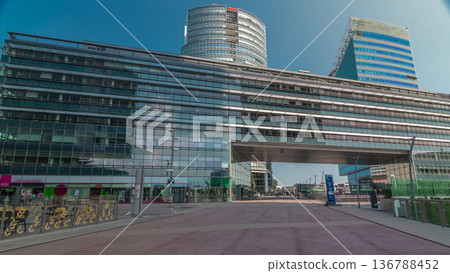Donaustadt Danube City timelapse hyperlapse is a modern quarter with skyscrapers and business centres in Vienna, Austria. 136788452