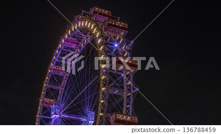 Wiener Riesenrad in Prater night timelapse - oldest and biggest ferris wheel in Austria. 136788459