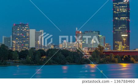 Beautiful cityscape with modern buildings day to night timelapse, the tallest skyscraper in Austria Beautiful cityscape with modern buildings day to night timelapse, the tallest skyscraper in Austria 136788460