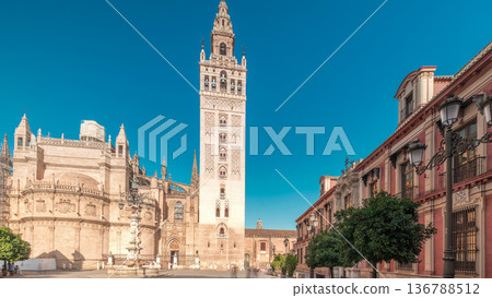 Seville Cathedral and Giralda Tower timelapse hyperlapse panorama, Spain Seville Cathedral and Giralda Tower timelapse hyperlapse panorama, Spain 136788512