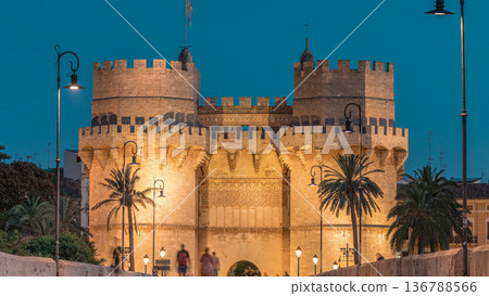 Serrans Towers or Torres de Serranos day to night timelapse in Valencia, Spain. Serrans Towers or Torres de Serranos day to night timelapse in Valencia, Spain. 136788566