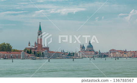Panoramic sea view of the San Giorgio Maggiore island and basilica Santa Maria della Salute timelapse in Venice, Italy. Panoramic sea view of the San Giorgio Maggiore island and basilica Santa Maria della Salute timelapse in Venice, Italy. 136788567