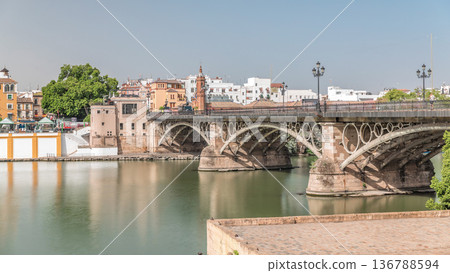 Puente de Isabel II bridge timelapse hyperlapse over the Guadalquivir River, Seville, Spain Puente de Isabel II bridge timelapse hyperlapse over the Guadalquivir River, Seville, Spain 136788594