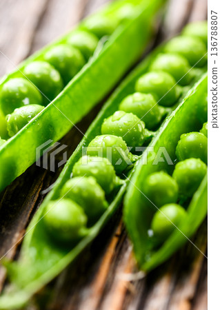 Fresh green peas in pod close up Fresh green peas in pod close up 136788807