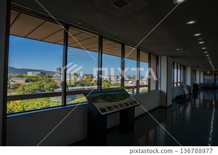 Kumamoto Castle as seen from the observation lobby of Kumamoto City Hall 136788977