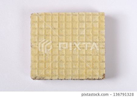Single Square Wafer Biscuit on White Background 136791328