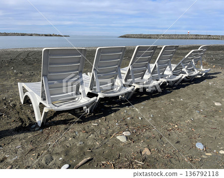 sun loungers for relaxing on the beach on a sunny day sun loungers for relaxing on the beach on a sunny day 136792118