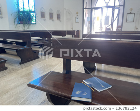 new testament on the bench in the Catholic chirch 136792124