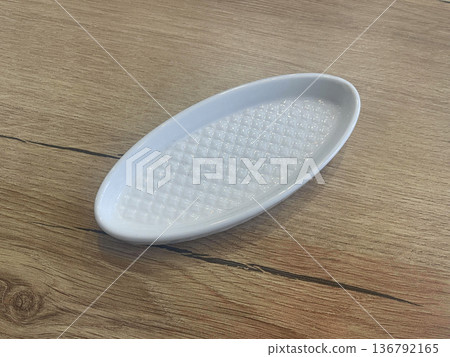 white bowl isolated on wooden table 136792165