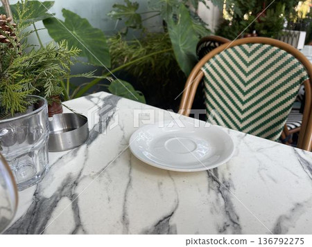 a saucer on the table 136792275