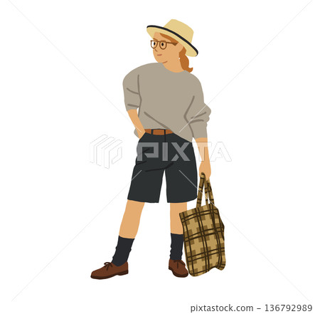 A woman in casual clothes carrying a handbag 136792989