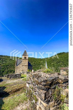 Esch-sur-Sure, Wiltz, Grand-Duche de Luxembourg, September 07, 2025, Quaint stone church with Esch-sur-Sure, Wiltz, Grand-Duche de Luxembourg, September 07, 2025, Quaint stone church with 136793687