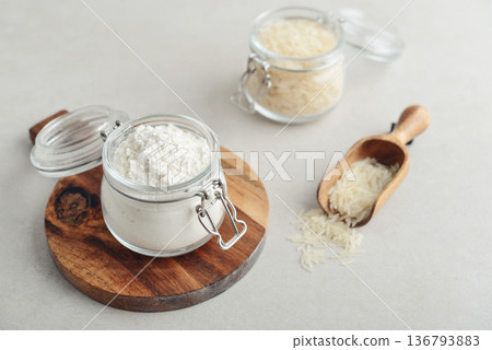 Rice flour in glass jar with raw 136793883