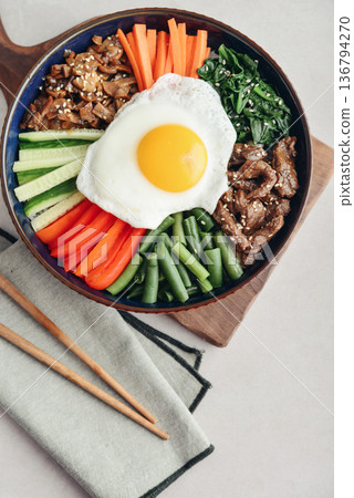Bibimbap on a concrete background 136794270