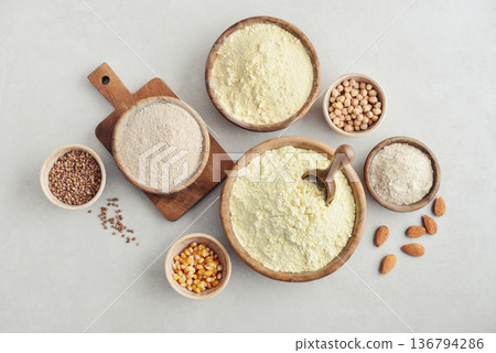 Wooden bowls with different types of gluten free flour Wooden bowls with different types of gluten free flour 136794286